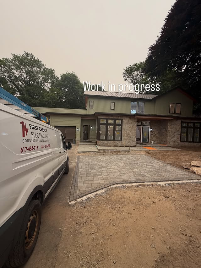 First Choice Electric van parked at a Massachusetts new construction job site